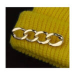 Pross Golden pin brooch